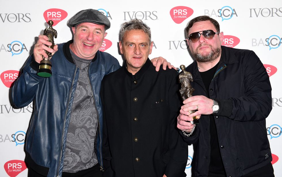 (left to right) Mark Day, Paul Ryder and Shaun Ryder of The Happy Mondays with the Inspiration Award during the 61st Annual Ivor Novello Music Awards. Paul Ryder, bass player and founding member of the Happy Mondays, has died aged 58, the band has announced. Issue date: Friday July 15, 2022.