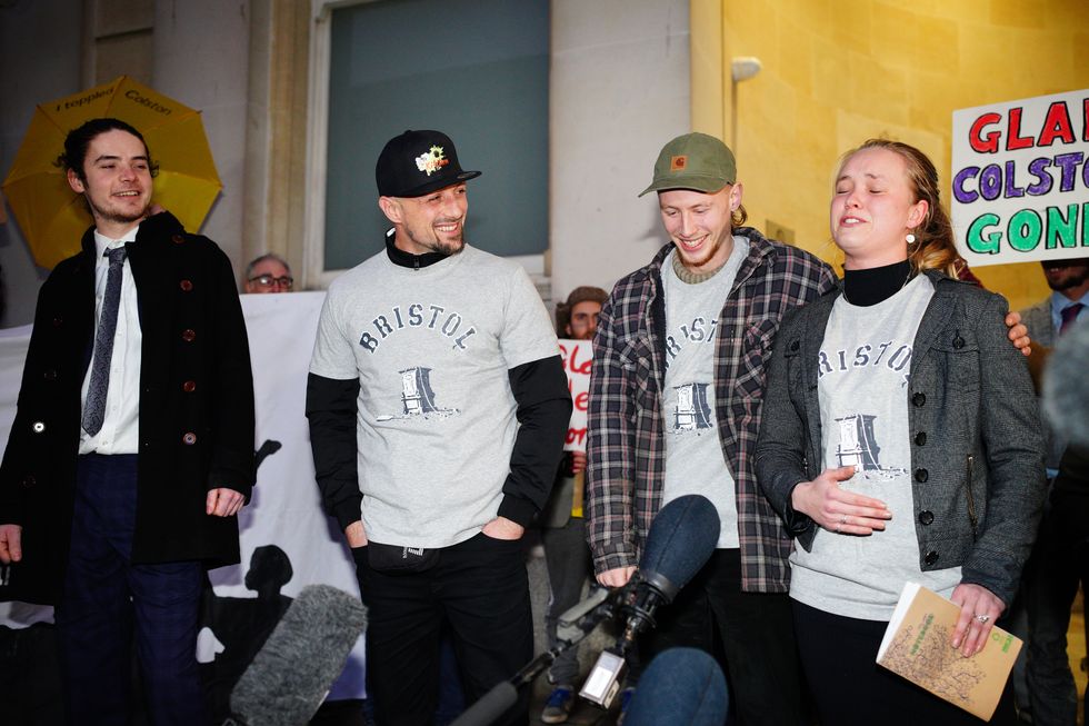 (left to right) Sage Willoughby, Jake Skuse, Milo Ponsford and Rhian Graham outside Bristol Crown Court. They have been cleared of criminal damage for pulling down a statue of slave trader Edward Colston during a Black Lives Matter protest in June 2020. Picture date: Wednesday January 5, 2022.