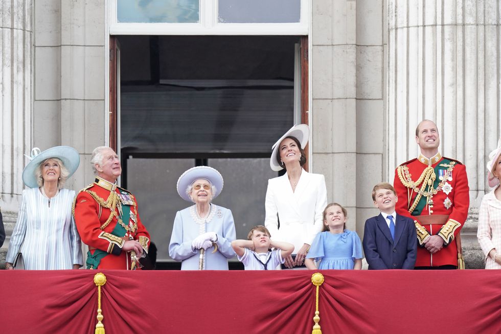 (Left to right) The Duchess of Cornwall, the Prince of Wales , Queen Elizabeth II , Prince Louis, the Duchess of Cambridge, Princess Charlotte, Prince George, and the Duke of Cambridge, on the balcony of Buckingham Palace, to view the Platinum Jubilee flypast, on day one of the Platinum Jubilee celebrations. Picture date: Thursday June 2, 2022.