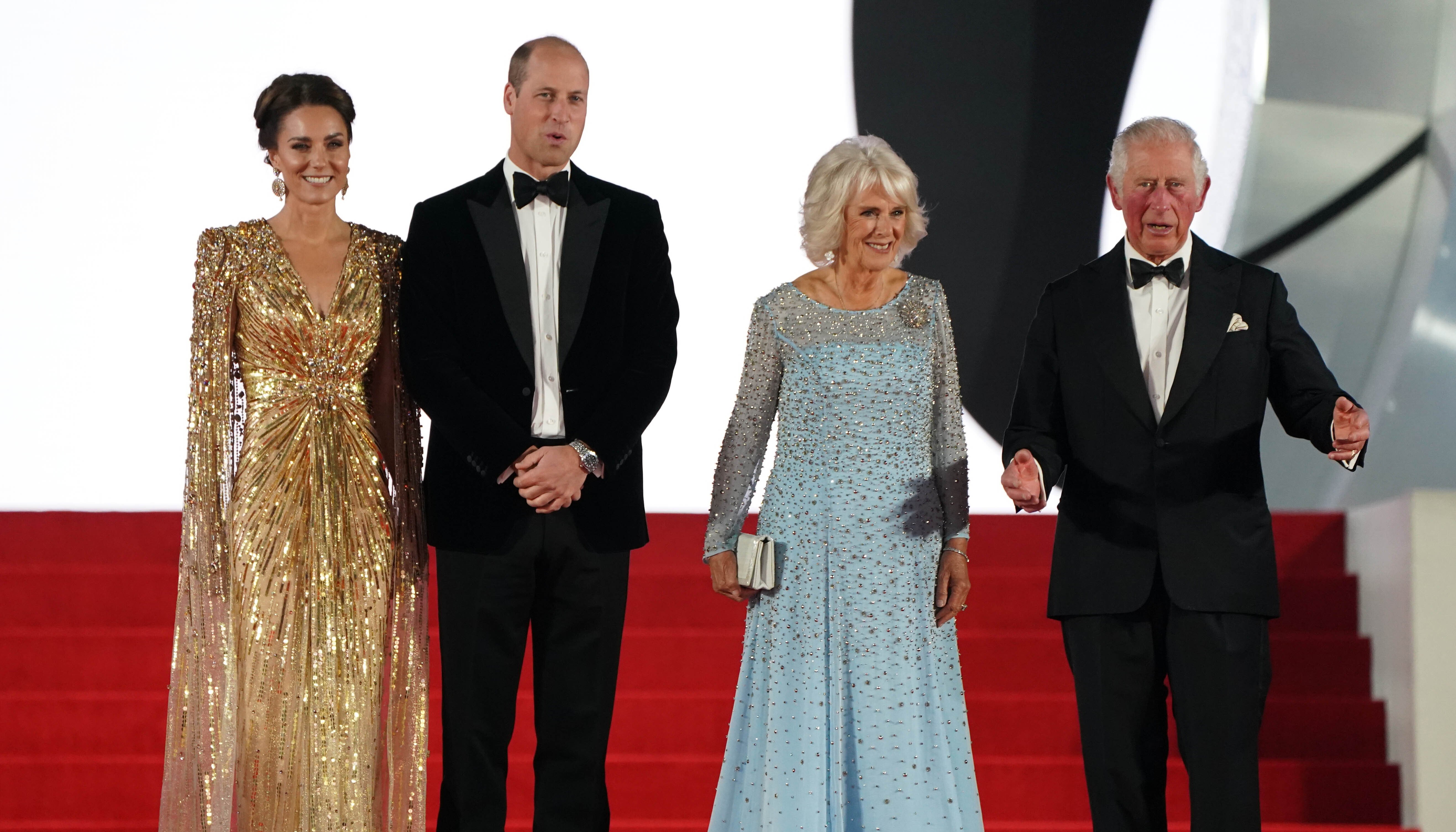 (left to right) The Duke of Cambridge, the Duchess of Cambridge, the Duchess of Cornwall and the Prince of Wales attending the World Premiere of No Time To Die, held at the Royal Albert Hall in London. Picture date: Tuesday September 28, 2021.