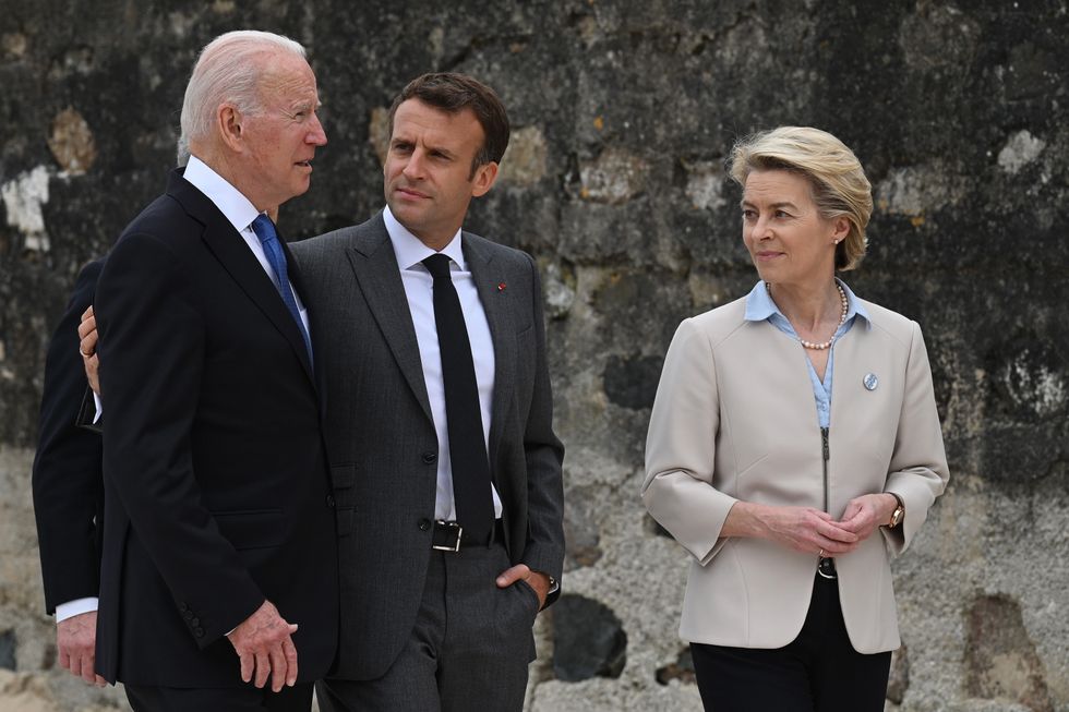 (left to right) US President Joe Biden, President of France Emmanuel Macron and European Commission Ursula von der Leyen after the leaders official welcome and family photo, during the G7 summit in Cornwall. Picture date: Friday June 11, 2021.
