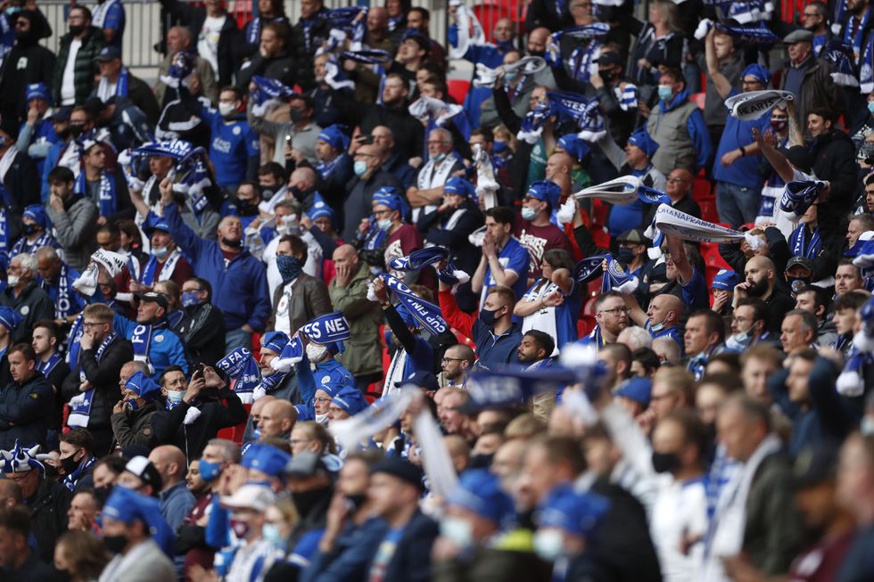 Leicester City fans cheer on their side from the stands during the Emirates FA Cup Final at Wembley Stadium. Picture date: Saturday May 15, 2021.