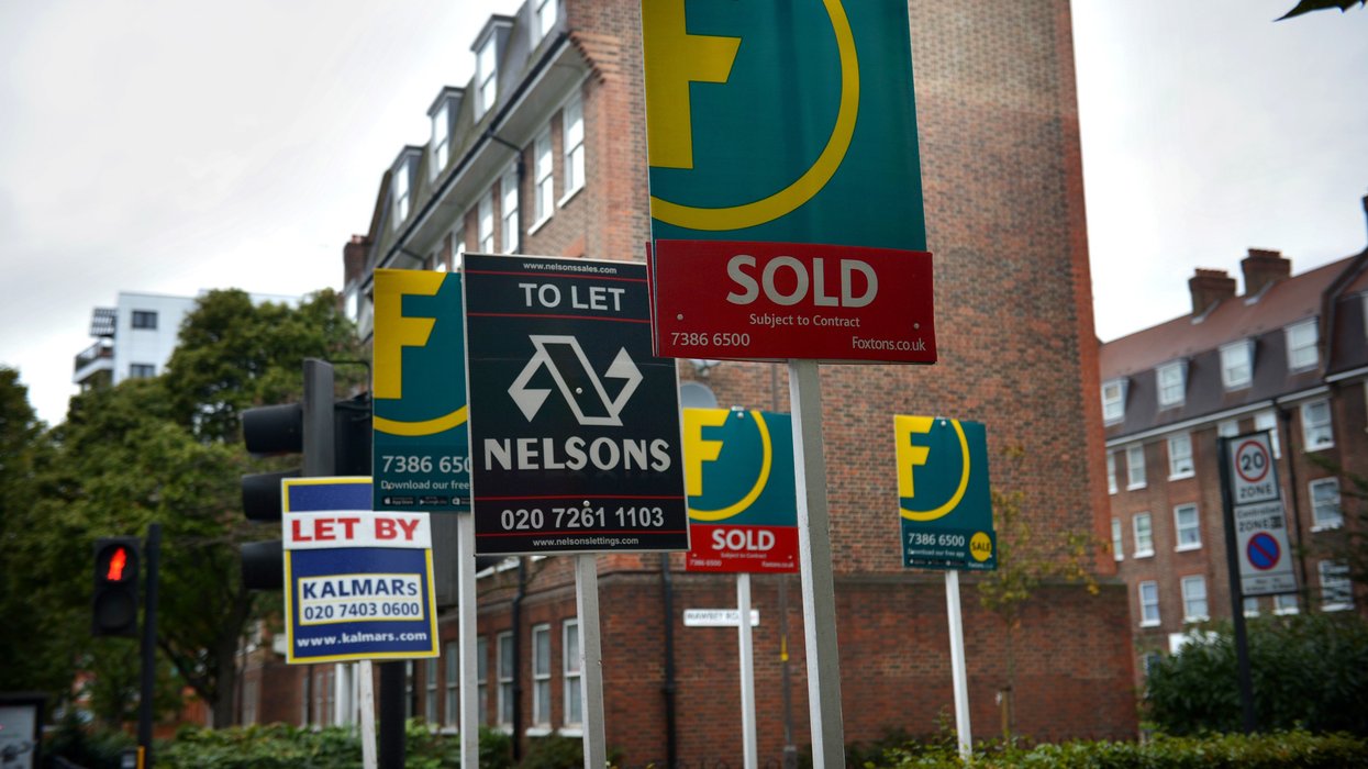 Letting and estate agents signs outside flats on the Old Kent Road in Londo