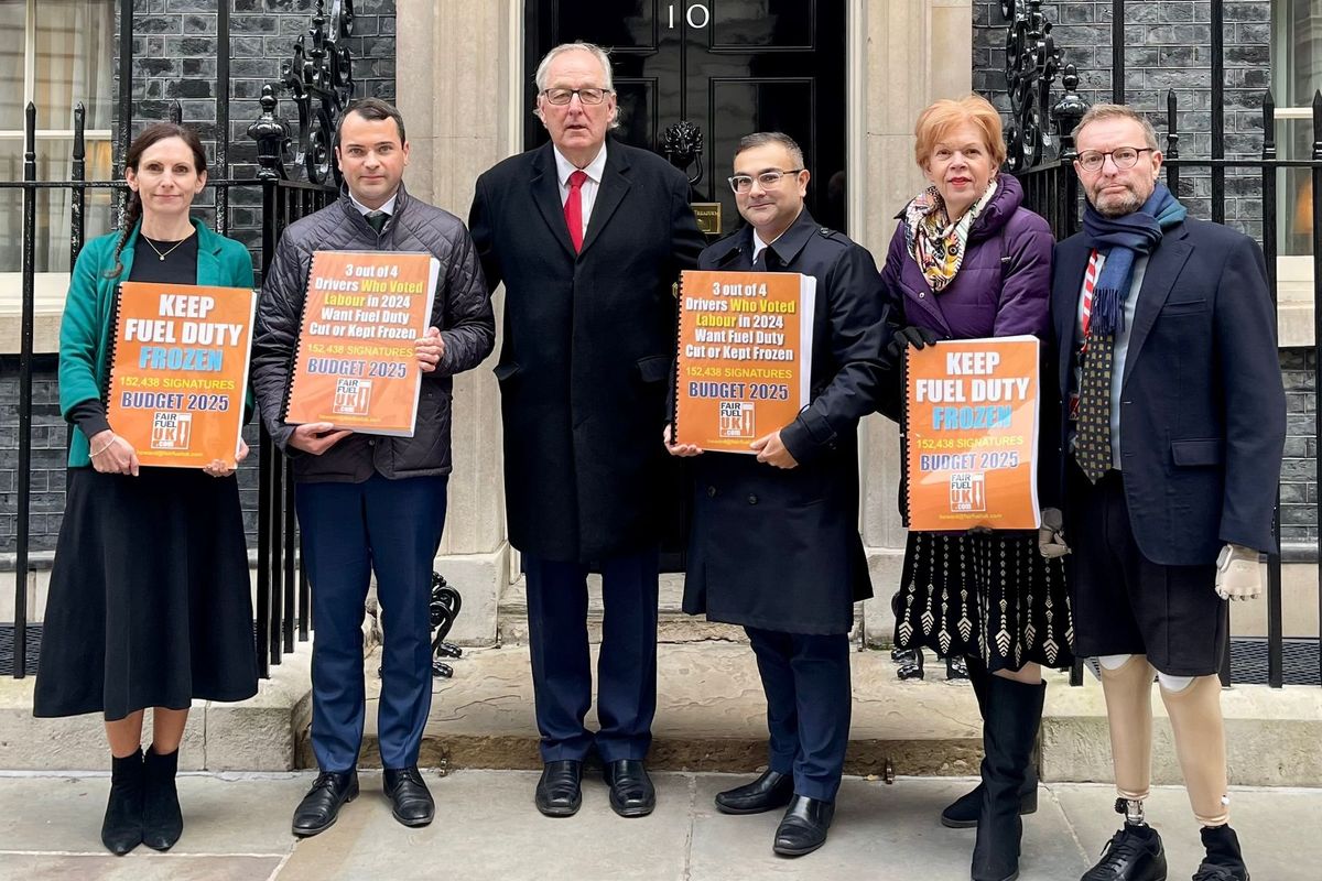 Lewis Cocking MP, FairFuelUK founder Howard Cox and Craig Mackinlay MP deliver a fuel duty petition to 10 Downing Street