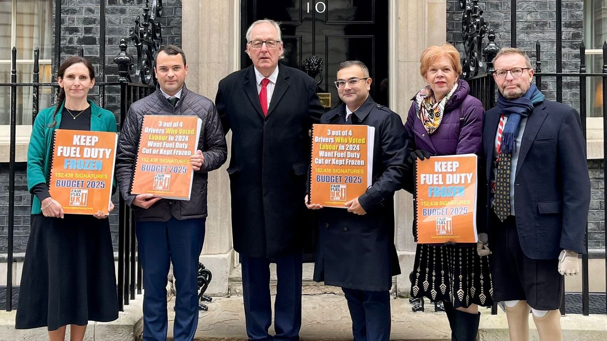 Lewis Cocking MP, FairFuelUK founder Howard Cox and Craig Mackinlay MP deliver a fuel duty petition to 10 Downing Street