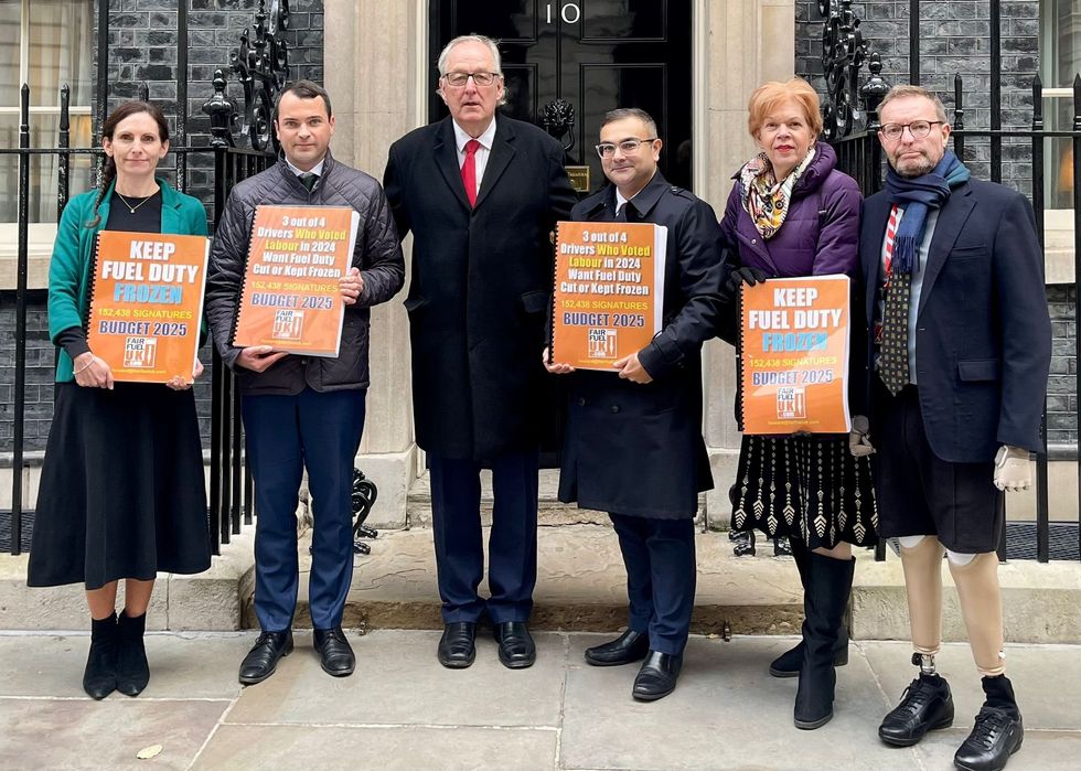 Lewis Cocking MP, FairFuelUK founder Howard Cox and Craig Mackinlay MP deliver a fuel duty petition to 10 Downing Street