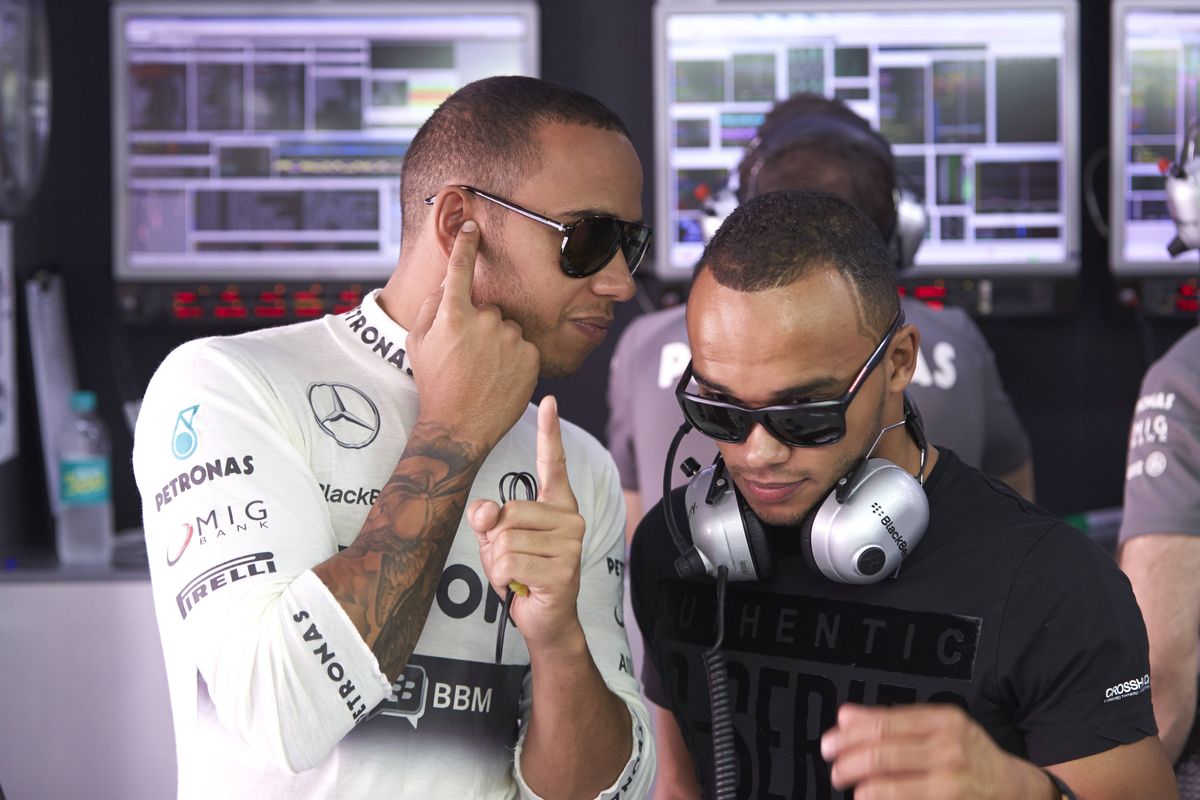 Lewis Hamilton alongside his brother Nicolas