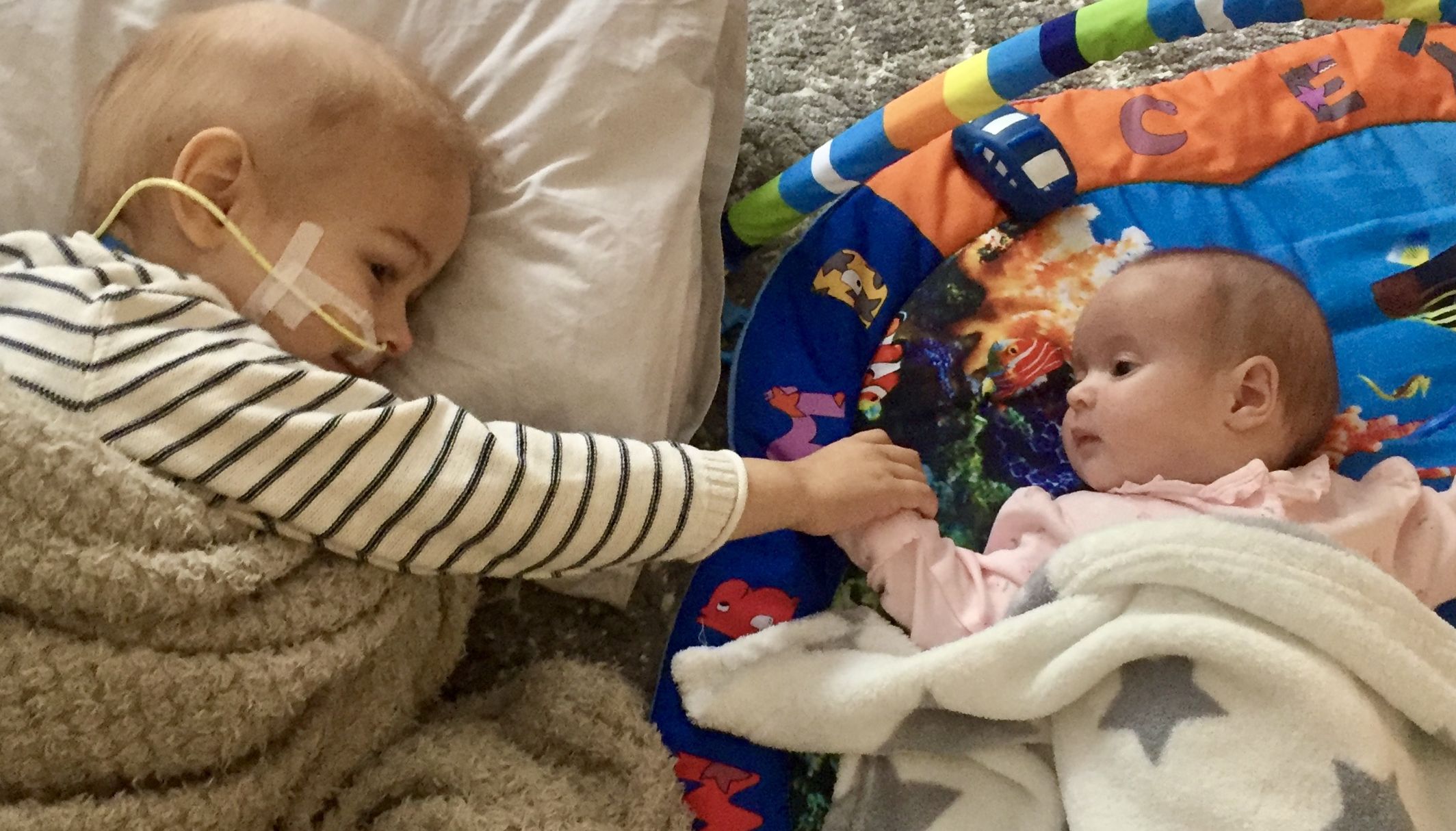 Liam Scott (left) and baby sister Kylie.