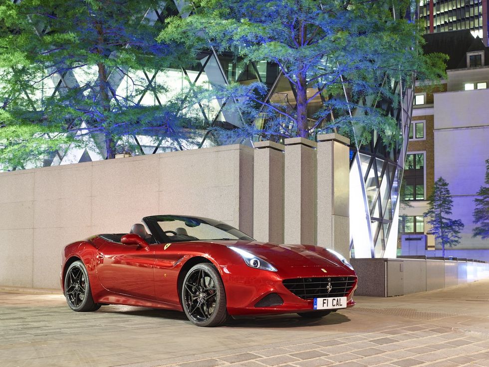 Licence plate on red Ferrari car