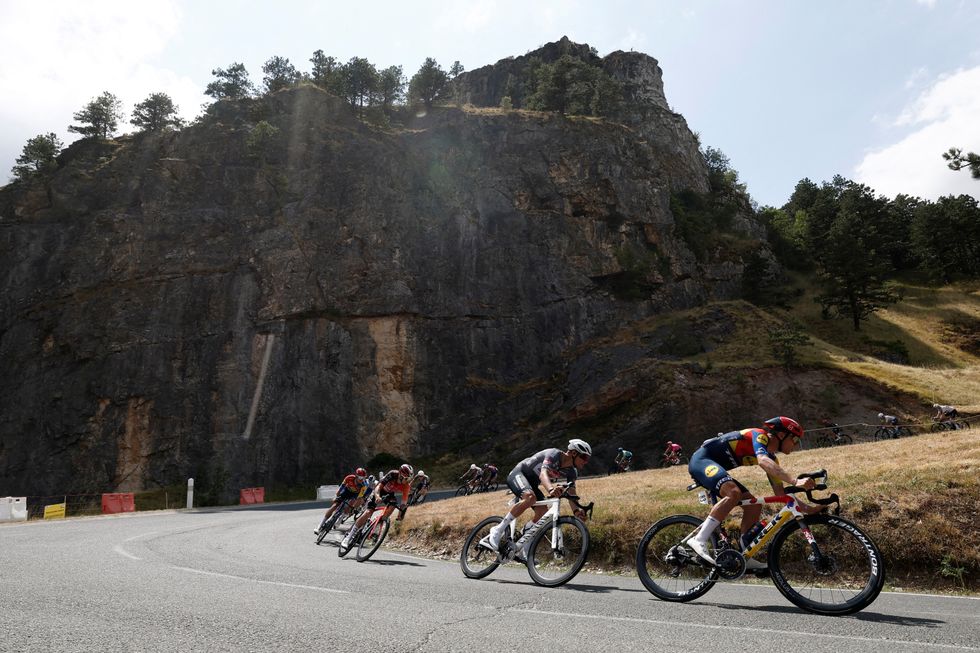 Lidl - Trek's Thibau Nys and Alpecin-Deceuninck's Mathieu Van Der Poel in action with riders during Stage 15