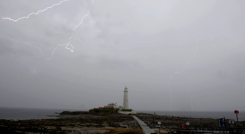 Lightning strikes over St Mary's Lighthouse in Northumberland during a previous thunderstorm