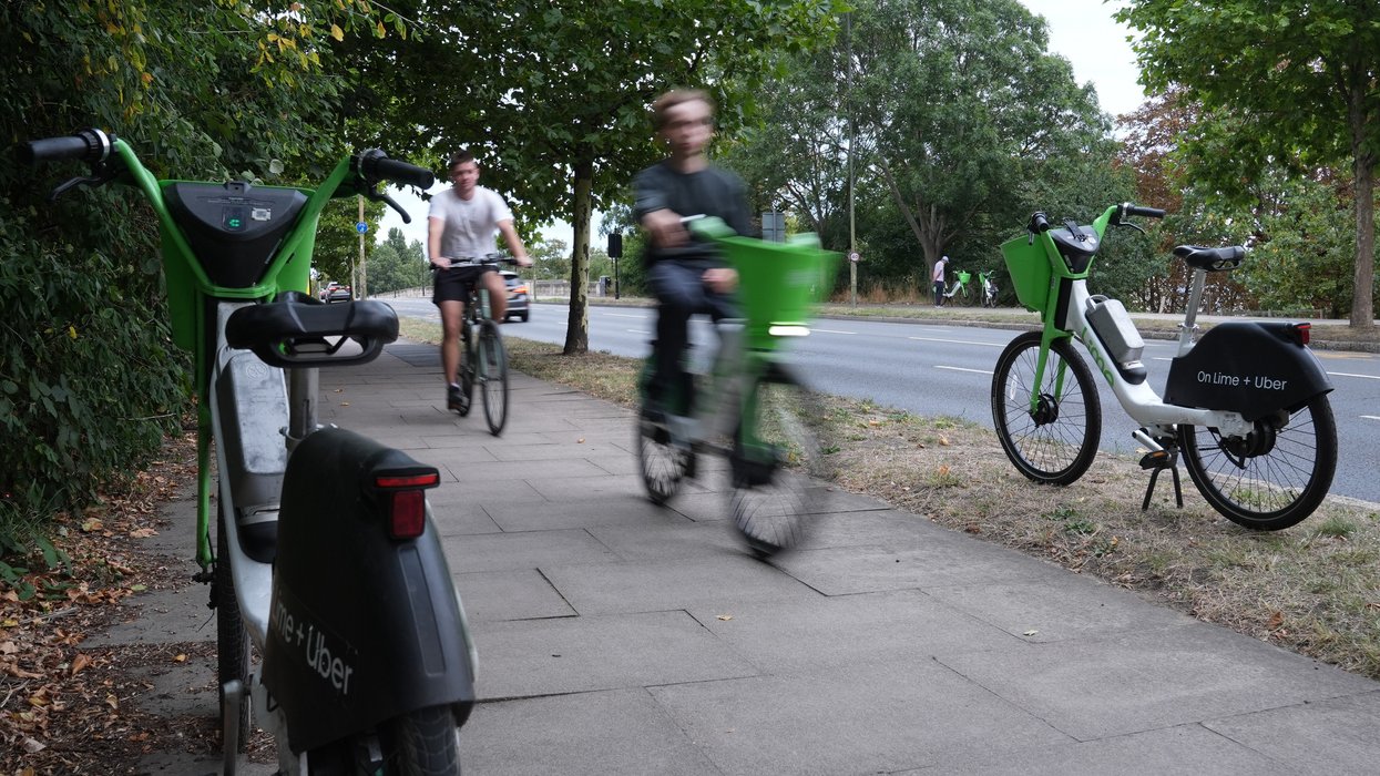 Lime bike on pavement