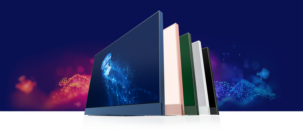 line-up of Sky Glass smart TVs in different colours with a bright background