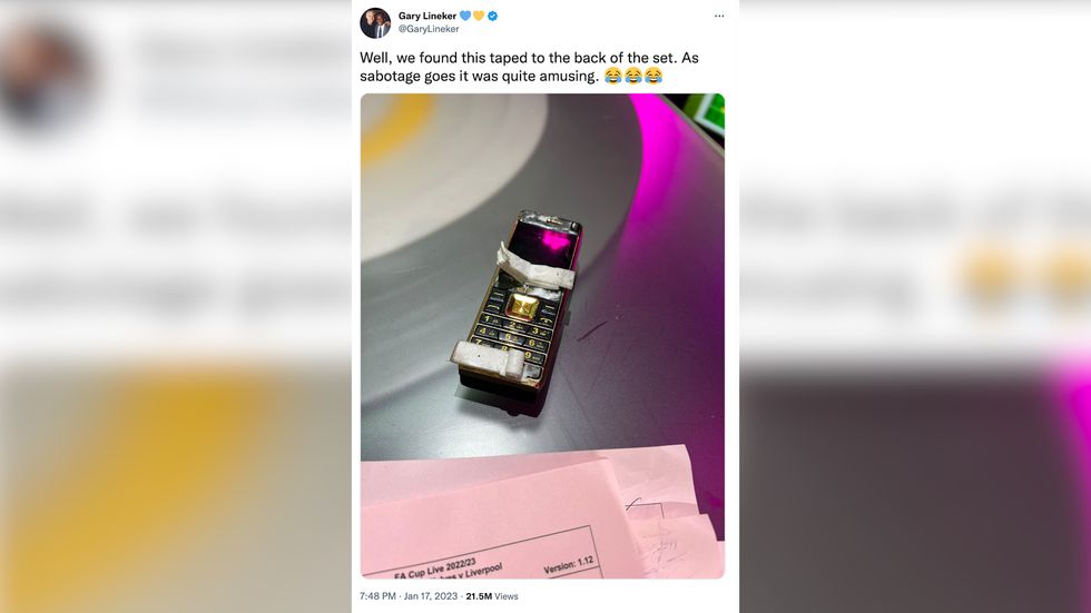 Lineker shared a picture of the culprit, a mobile phone taped to the set.