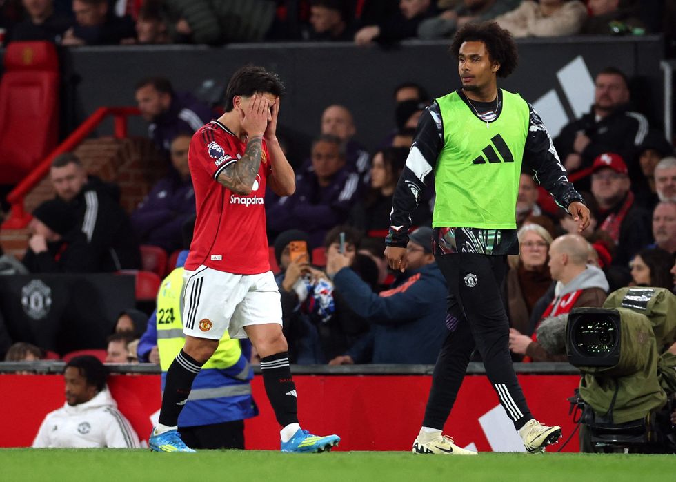 Lisandro Martinez was comforted by Joshua Zirkzee after his dismissal in Man United's shock loss to Leeds