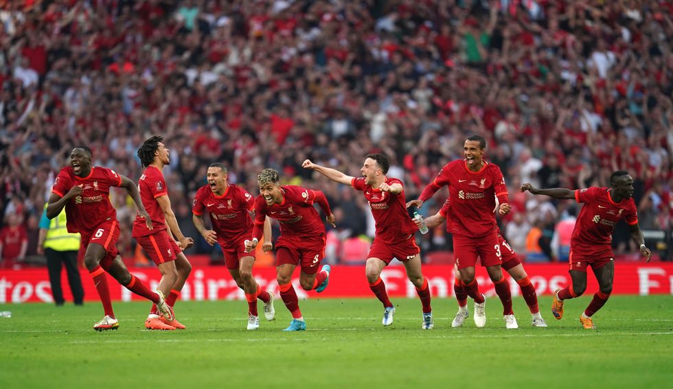 Liverpool celebrate winning the Emirates FA Cup final at Wembley Stadium, London. Picture date: Saturday May 14, 2022.