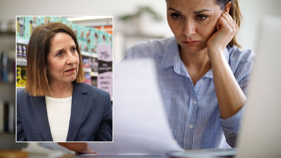 Liz Kendall and concerned woman