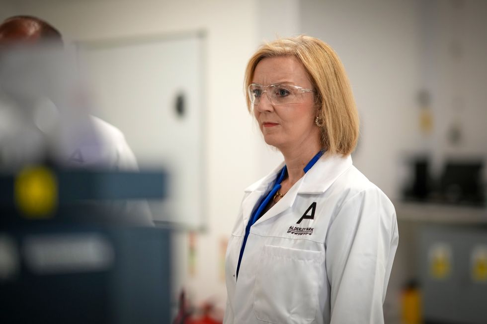 Liz Truss speaks to scientists during a campaign visit to a life sciences laboratory at Alderley Park in Manchester, as part of the campaign to be leader of the Conservative Party and the next prime minister. Picture date: Wednesday August 10, 2022.