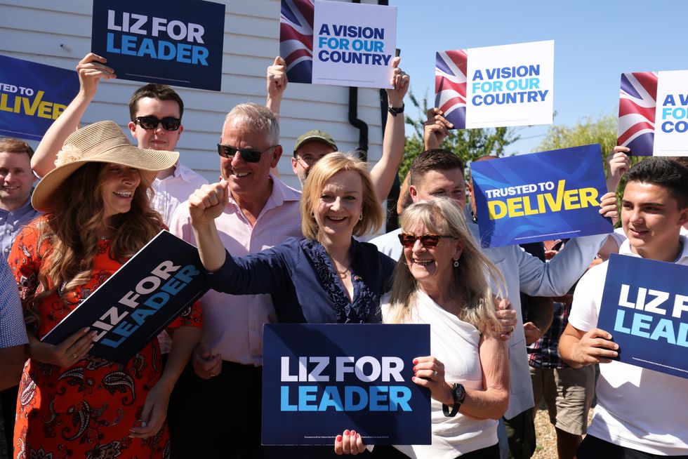 Liz Truss speaks to supporters during a visit to Ashley House, Marden, Kent