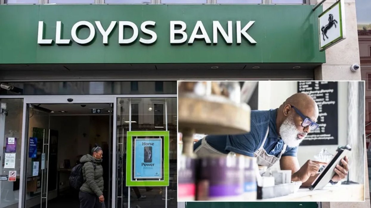 Lloyds Bank and man on device