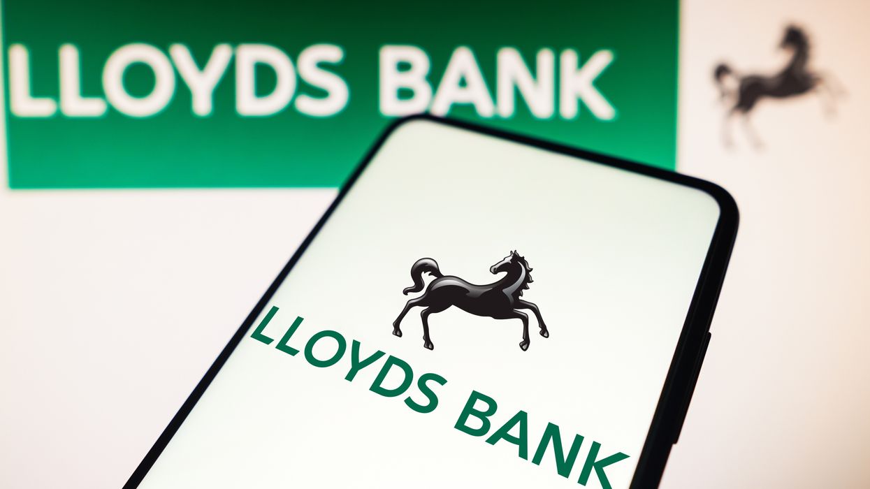 Lloyds Bank logo on mobile and sign
