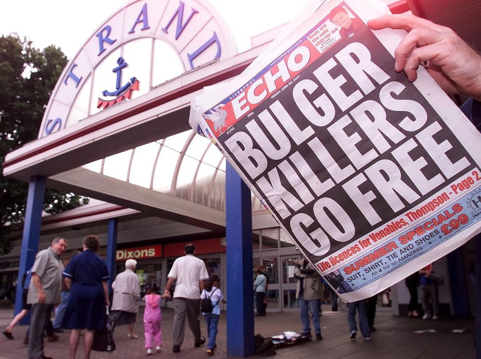 Local people read about the release of the killers of James Bulger in the Liverpool Echo newspaper.