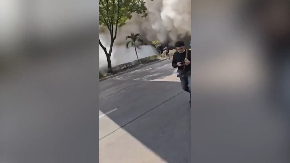 Locals flee the scene