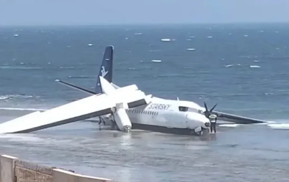 Locals had been walking along Jasiira beach when the plane was seen flying unusually low to the water