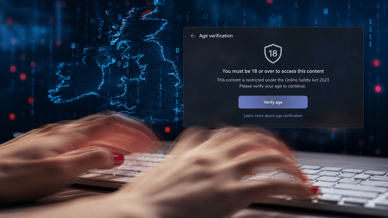 login verification in front of hands typing on keyboard