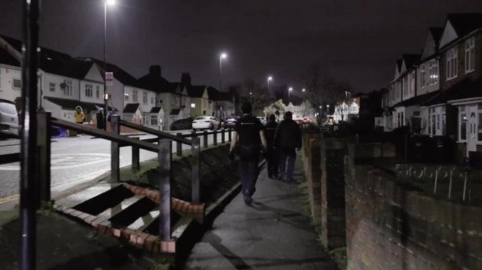 Watch moment suspected people smugglers are arrested in early morning raids as more than 50 immigration officers descend on London