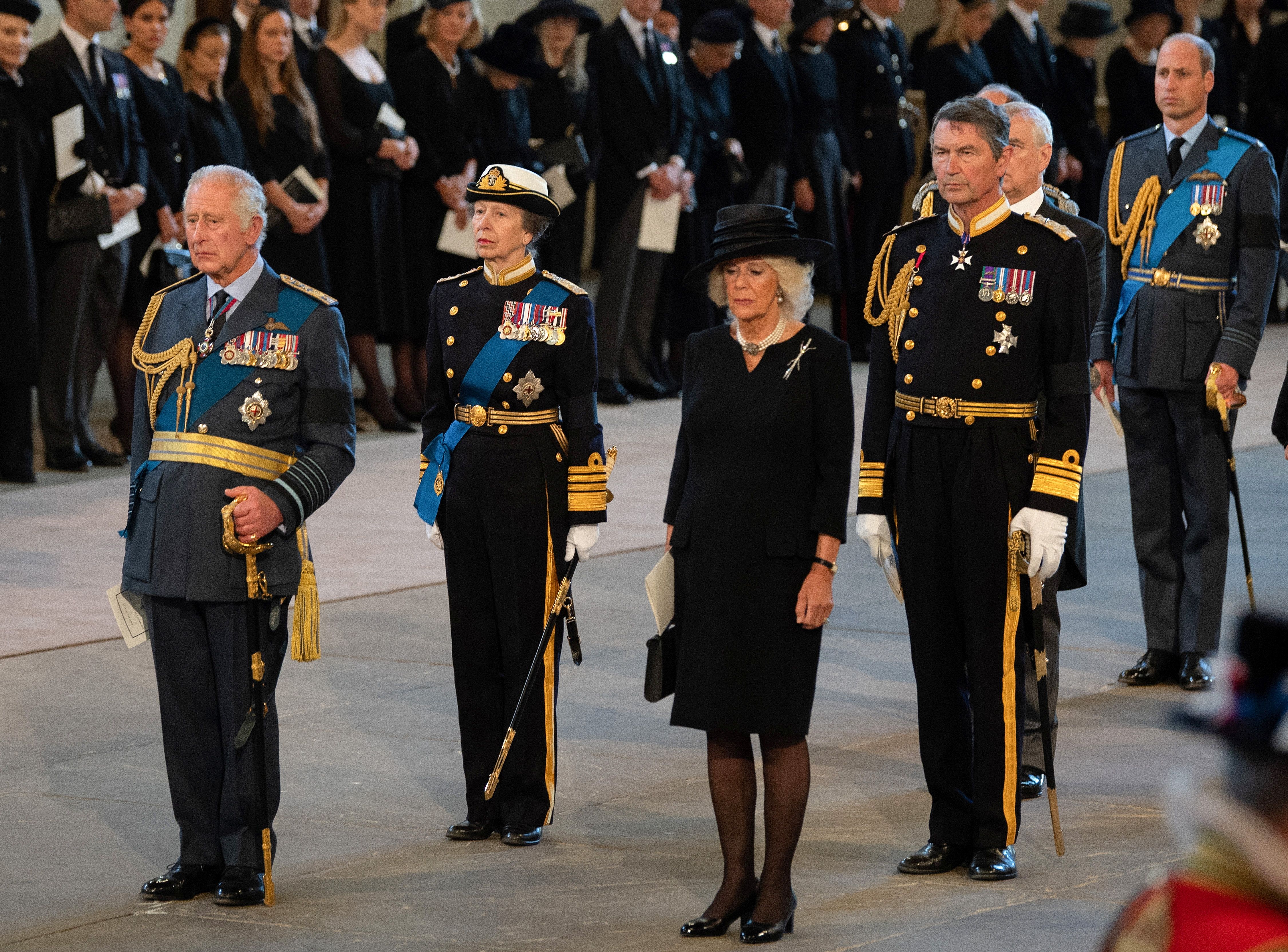 LONDON, ENGLAND - SEPTEMBER 14: King Charles III, Anne, Princess Royal, Camilla, Queen Consort, Vice Admiral Sir Timothy Laurence, Prince Andrew, Duke of York and Prince William, Prince of Wales pay their respects in The Palace of Westminster during the procession for the Lying-in State of Queen Elizabeth II on September 14, 2022 in London, England.  David Ramos/Pool via REUTERS