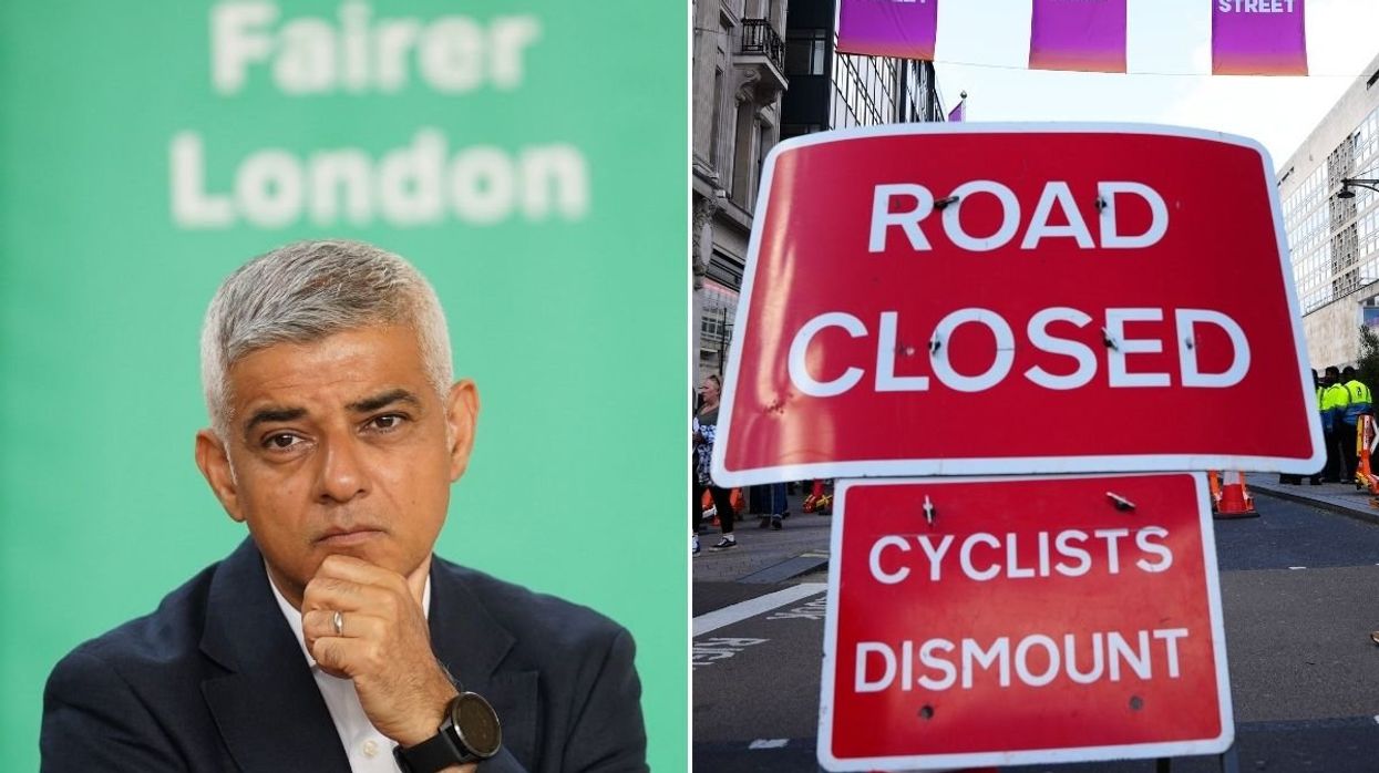 London Mayor Sadiq Khan and a 'road closed' sign on Oxford Street