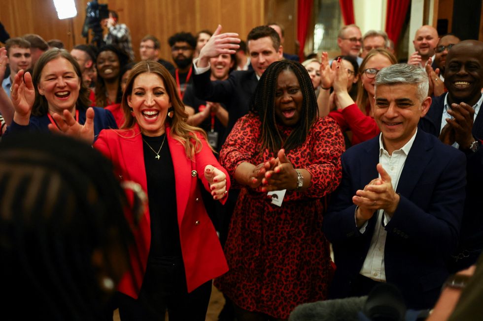 London Mayor Sadiq Khan and Labour MP Dr Rosena Allin-Khan celebrate in Wandsworth