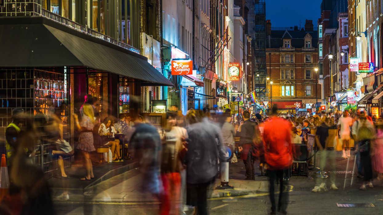 London Soho nightlife people enjoying bars and restaurants