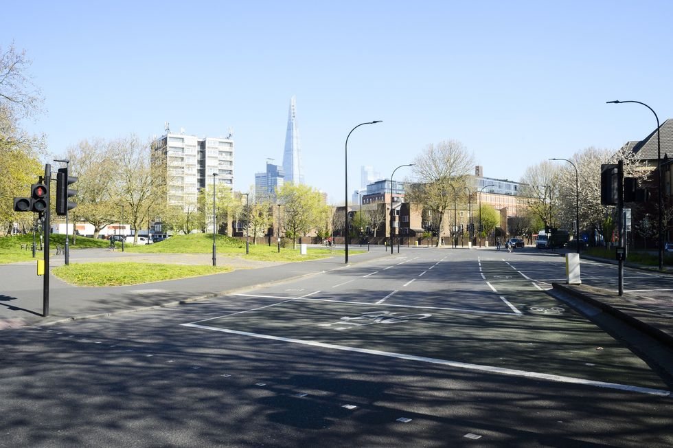 London, Southwark, major road in the residential district with view of the city behind