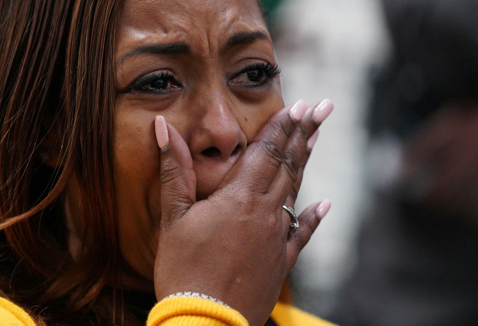 Lora Dene King, daughter of Rodney King, reacts as she attends a viewing of the video showing the beating of Tyre Nichols, the young Black man who was killed during a traffic stop by Memphis police officers, at a community event in Los Angeles, California, U.S., January 27, 2023.  REUTERS/Allison Dinner     TPX IMAGES OF THE DAY