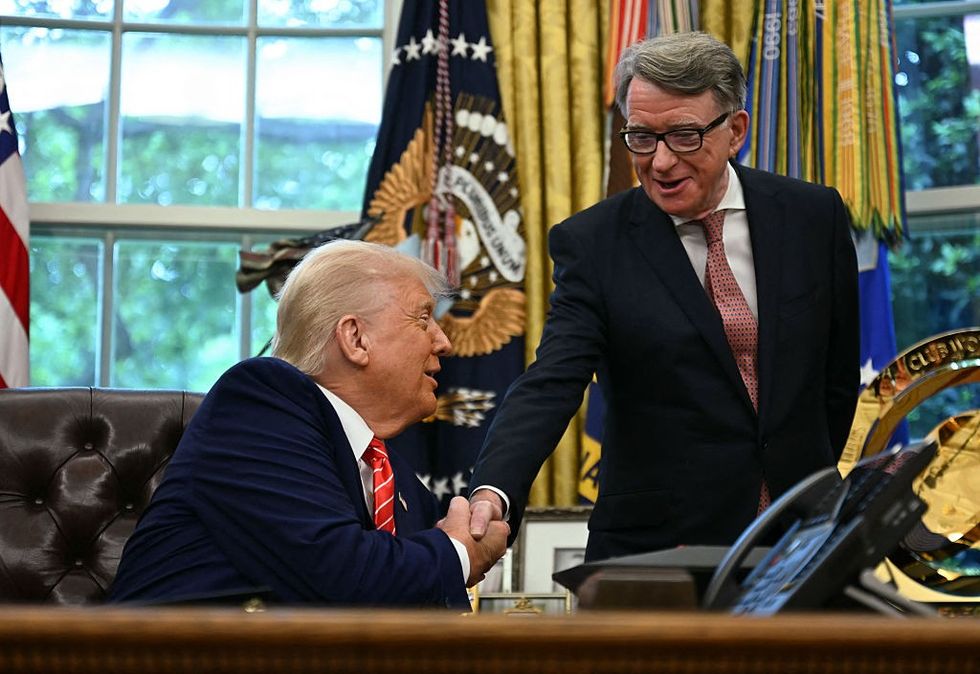 Lord Mandelson shakes hands with President Donald Trump