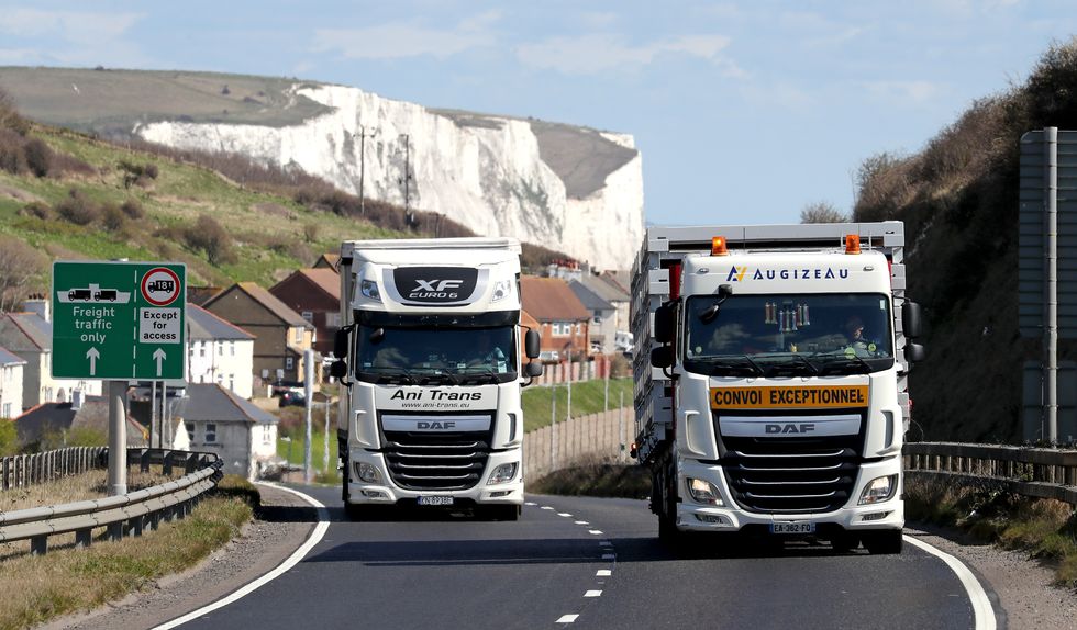 Lorries drive up A20 in Kent after arriving at the Port of Dover. Picture date: Tuesday April 6, 2021.