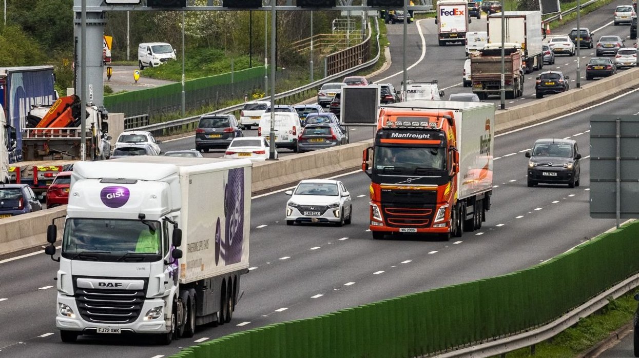 Lorries driving on a motorway near London