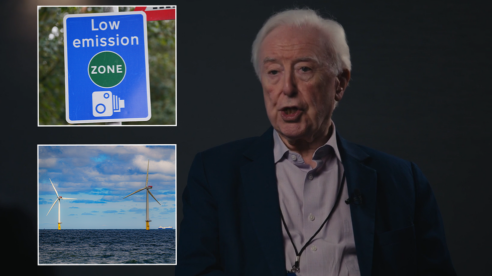 Low emission zone sign, wind turbines and John O'Sullivan