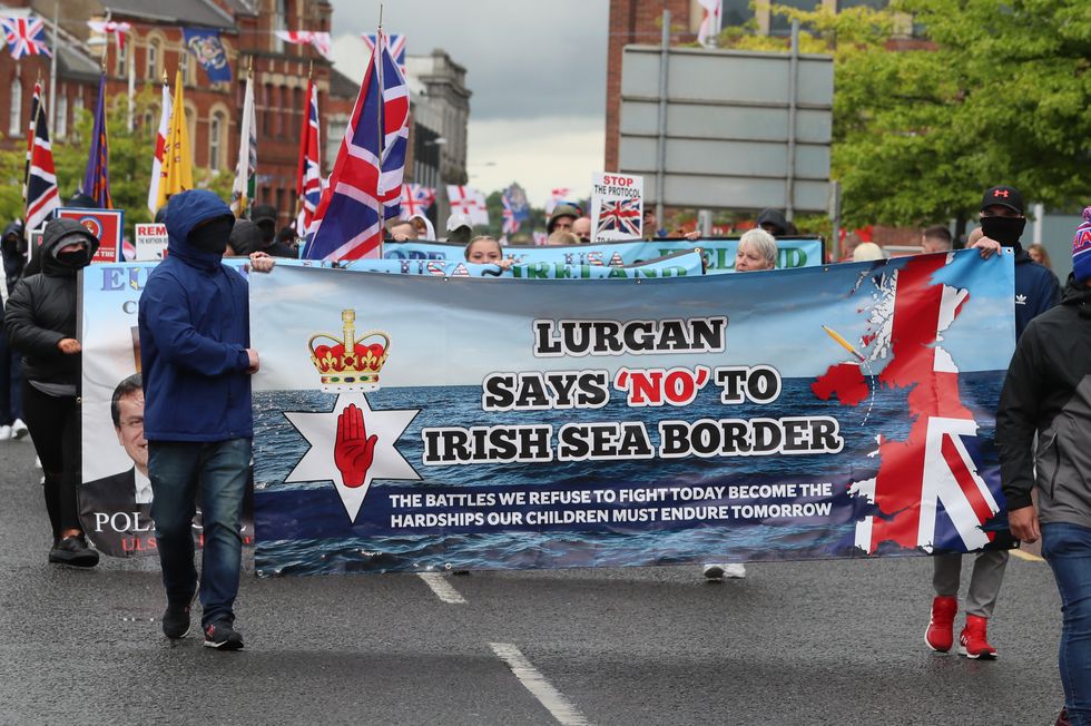 Loyalists take part in an anti-Northern Ireland Protocol rally in Portadown, Co Armagh.