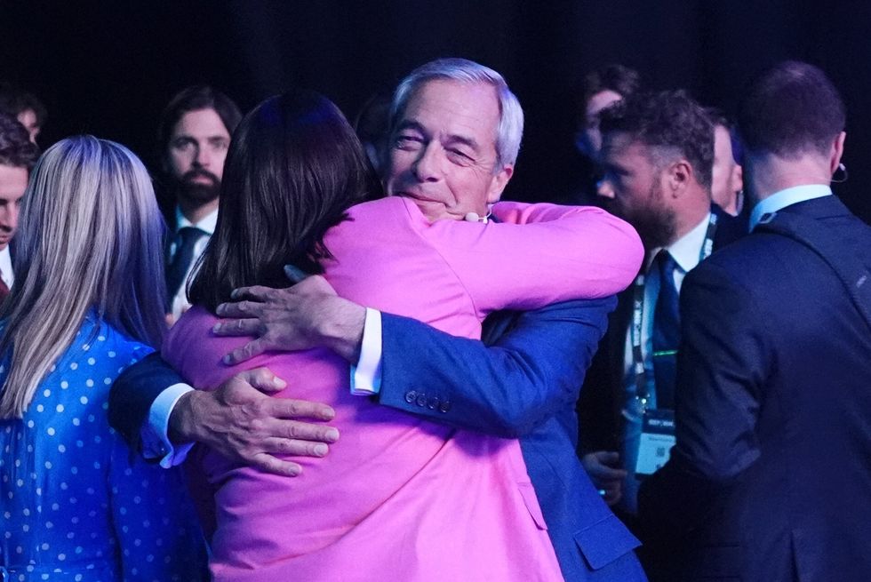 Lucy Connolly hugging Nigel Farage