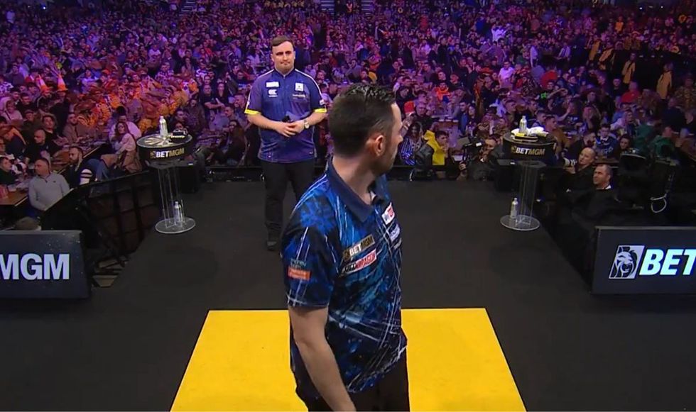 Luke Humphries appeared distracted by the whistle