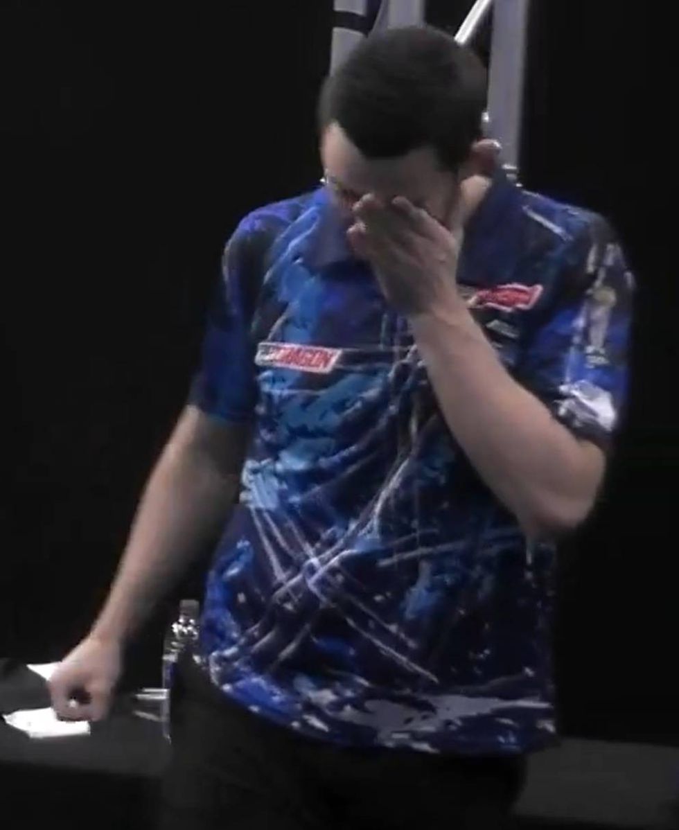 Luke Humphries looked distraught after the match
