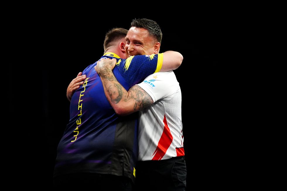 Luke Littler and Gerwyn Price shared an embrace after their Premier League clash