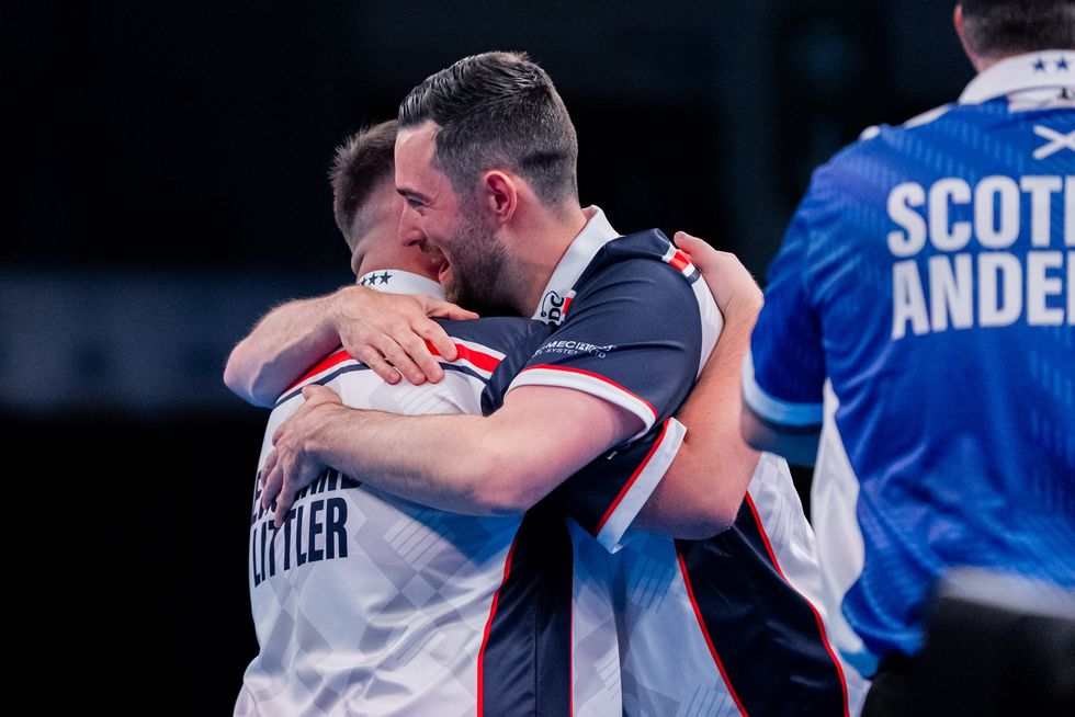 Luke Littler embraced Luke Humphries after their World Cup win with England