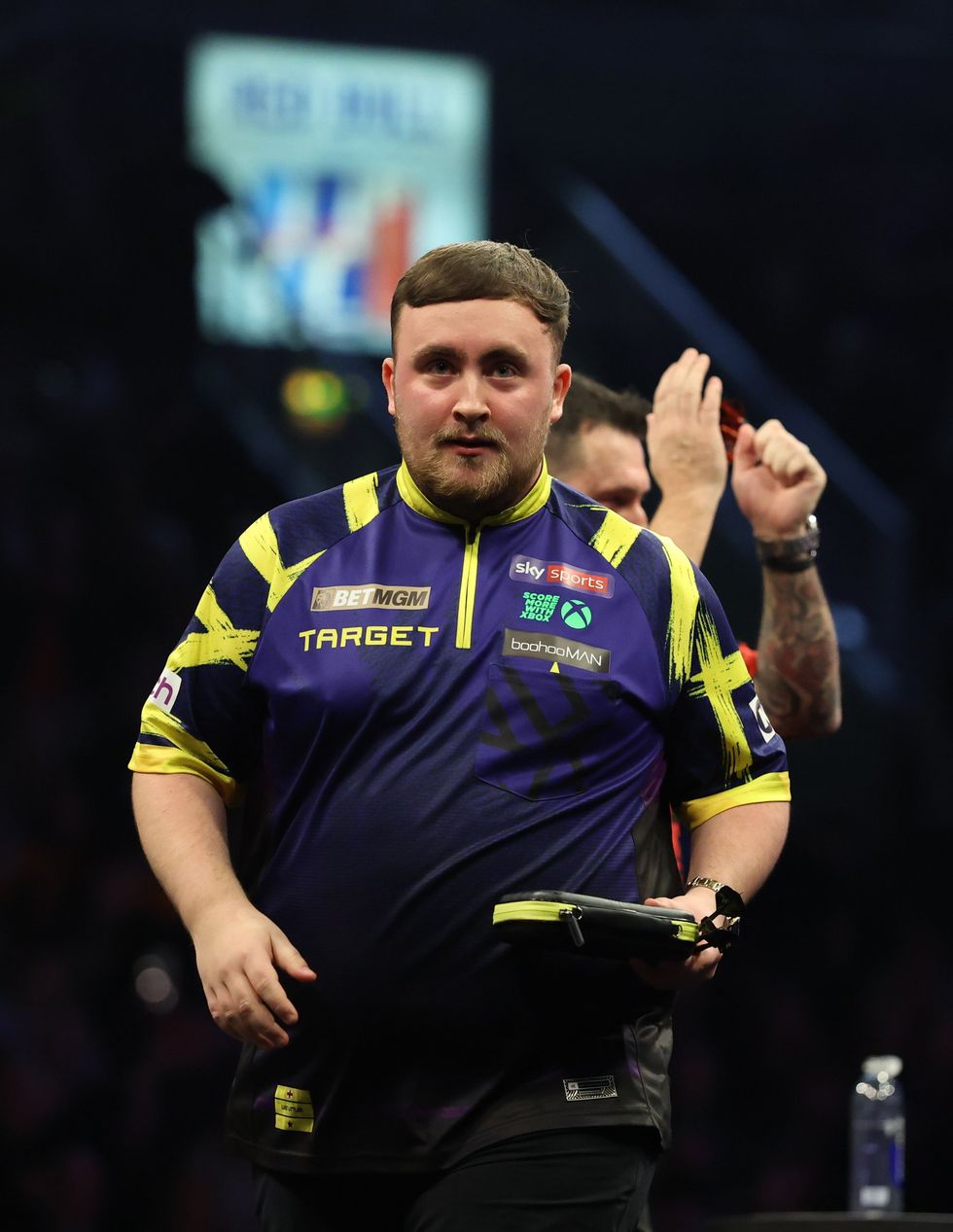 Luke Littler hurried off stage after his defeat following a brief few words with Jonny Clayton