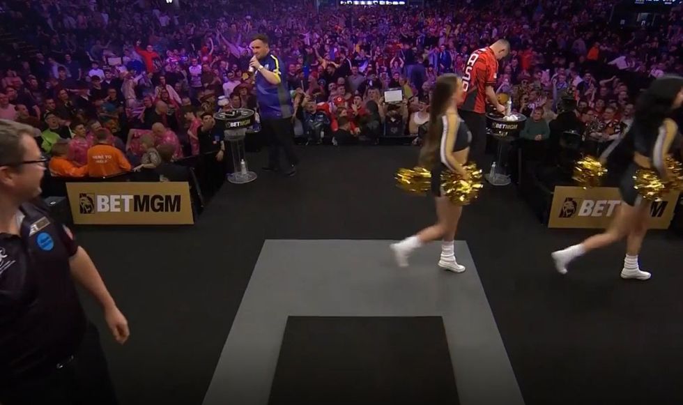 Luke Littler sheepishly returned to his table