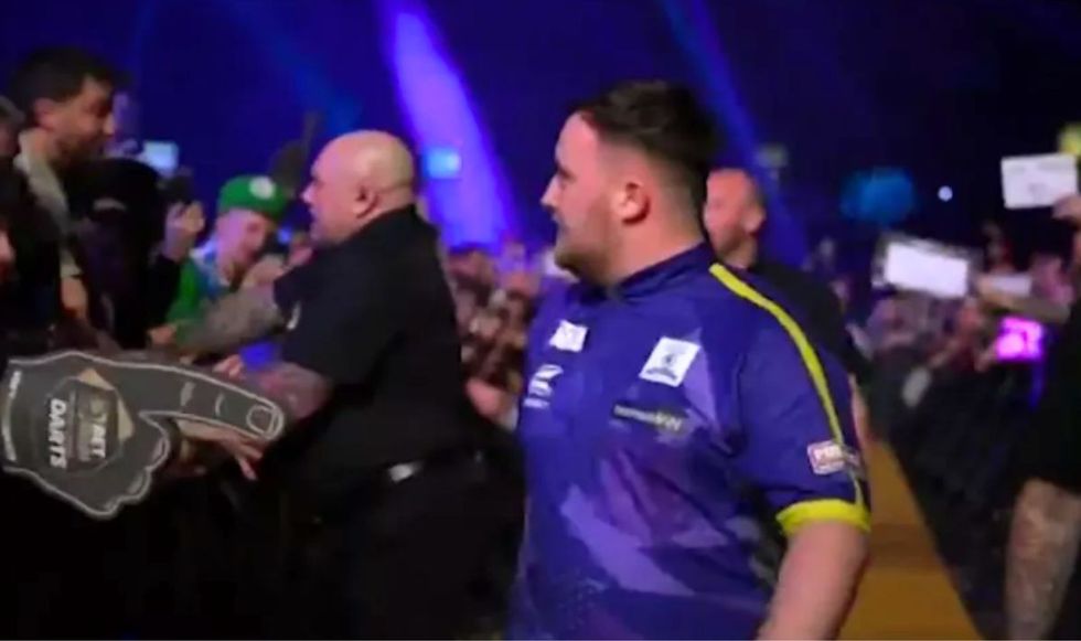 Luke Littler was grabbed by a fan