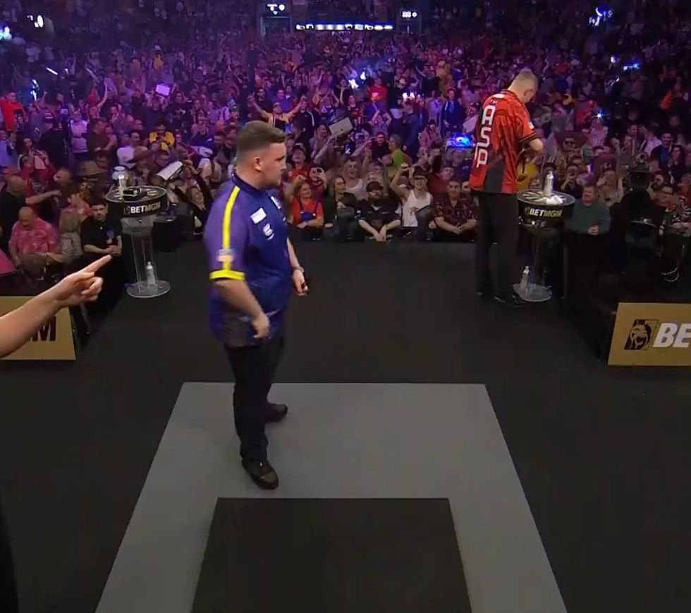 Luke Littler was reminded Nathan Aspinall would be throwing first